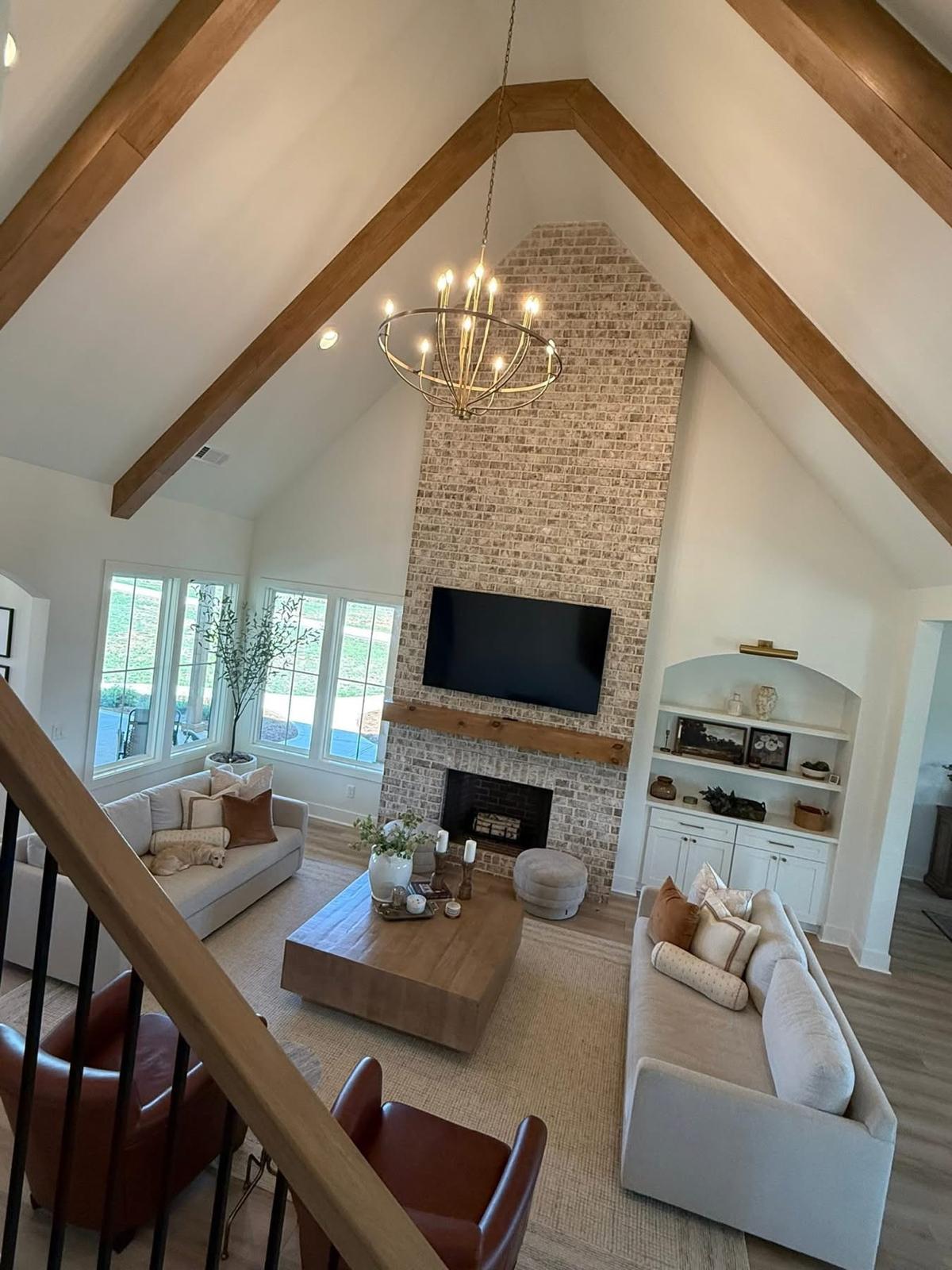 Spotless living room with vaulted ceilings