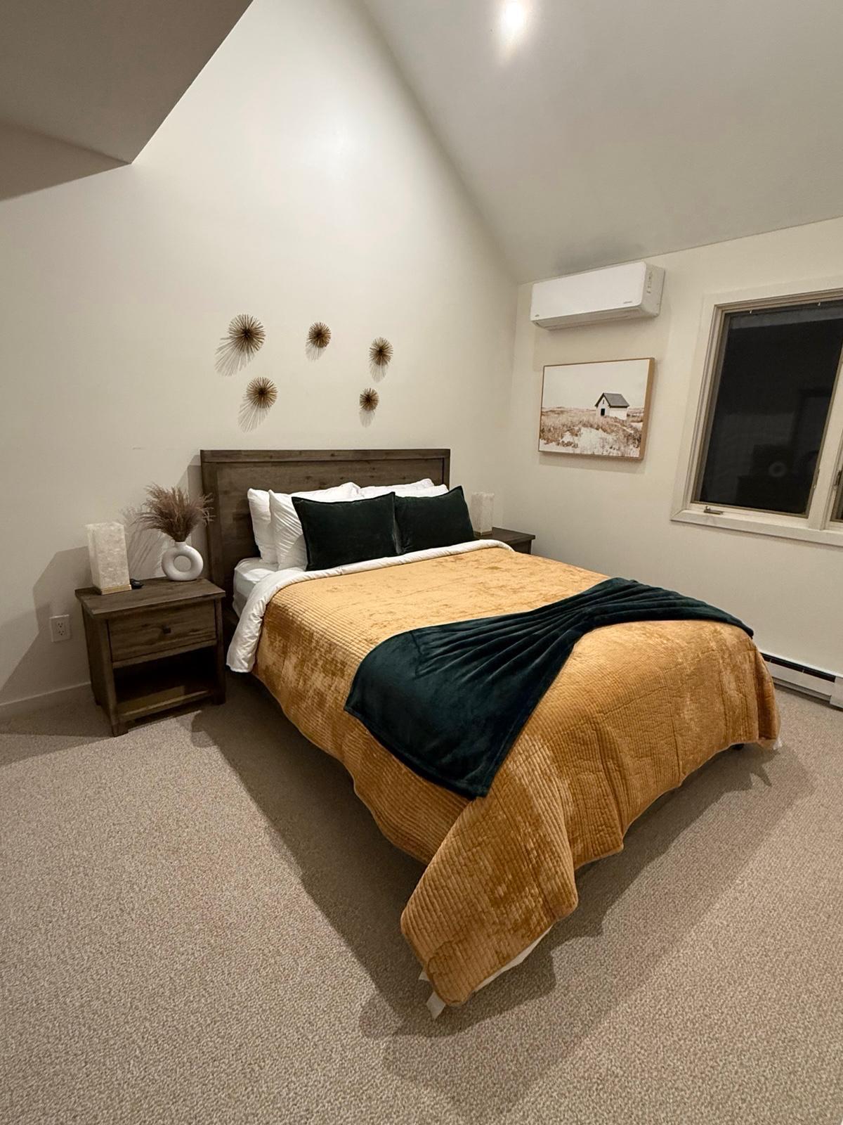 Warm bedroom with gold throw
