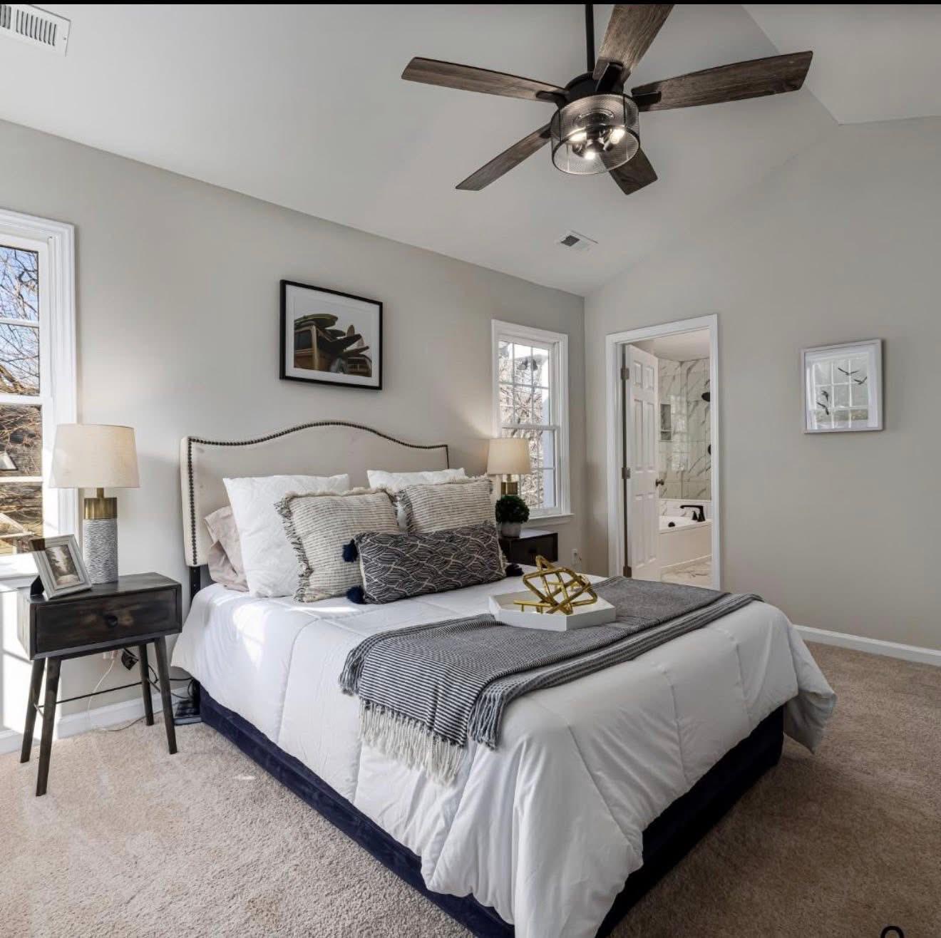 Tidy bedroom with vaulted ceiling