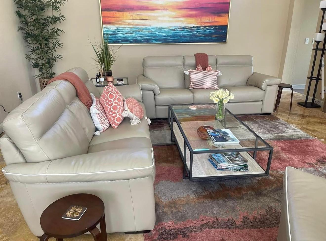 Cozy living room with sunset art